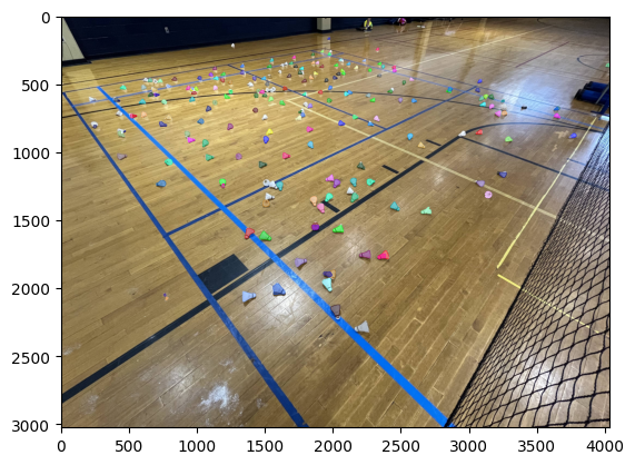 Mask R-CNN sliding-window detection overlaid on a photo of scattered shuttlecocks on a badminton court